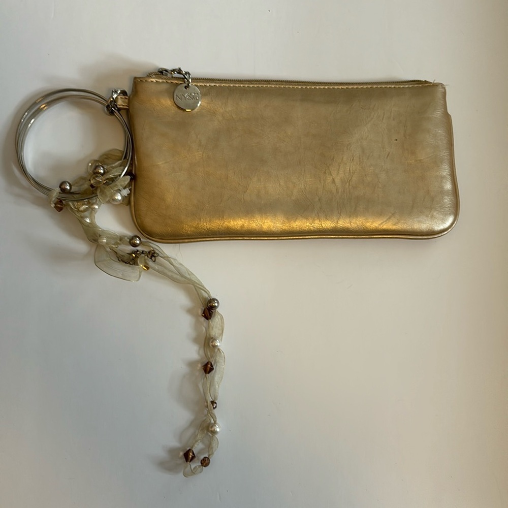 NY&CO GOLD WRISTLET WITH 3 RINGS AS WRISTLET HAS RIBBON DEATTACHABLE ADORNMENT
